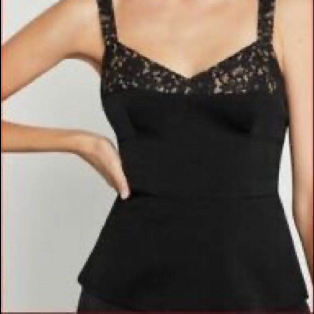 Black top, lace details, perfect for any occasion